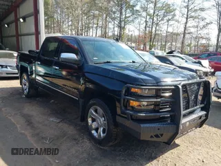 2015 Chevrolet Silverado 1500 LT with VIN 3GCUKREC7FG289322, listed as a IAAI auction lot 41608094 with 127,975 mi miles and . Bid and sale history available at DreamBid. Image 1.