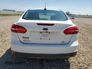 2018 Ford Focus SE with VIN 1FADP3FE0JL227146, listed as a Copart auction lot 56151985 with 124,517 mi miles and Salvage title. Bid and sale history available at DreamBid. Image 6.