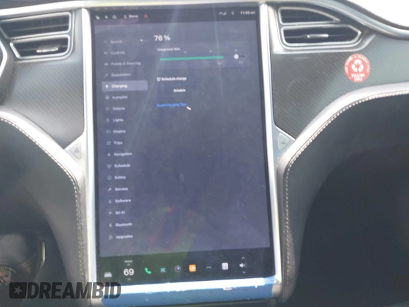 2015 Tesla Model S 85D with VIN 5YJSA1H21FFP79565, listed as a IAAI auction lot 42076401 with 162,139 mi miles. Bid and sale history available at carsss.com. Image 18.