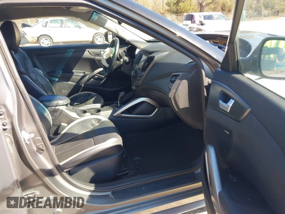 2015 Hyundai Veloster Turbo with VIN KMHTC6AE8FU229198, listed as a IAAI auction lot 41596345 with 74,943 mi miles. Bid and sale history available at carsss.com. Image 5.