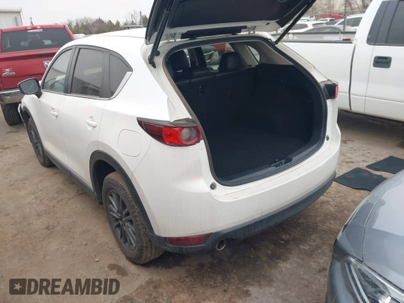 2021 Mazda CX-5 Touring with VIN JM3KFACM0M0412718, listed as a IAAI auction lot 41486753 with 41,496 mi miles. Bid and sale history available at carsss.com. Image 3.