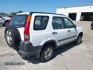 2002 Honda CR-V LX with VIN JHLRD684X2C010447, listed as a IAAI auction lot 42166268 with 233,336 mi miles and . Bid and sale history available at carsss.com. Image 4.