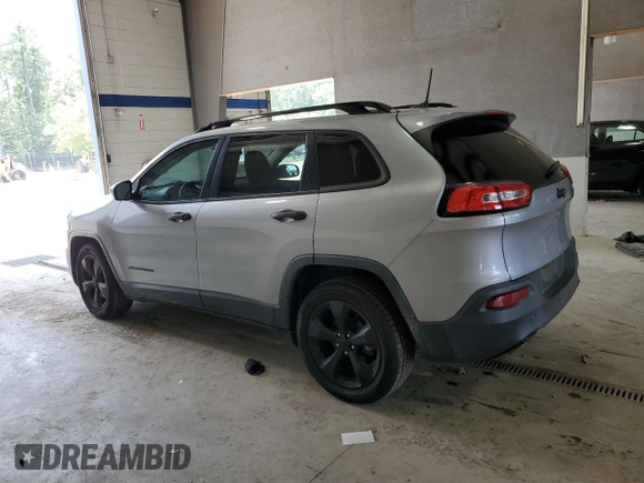 2017 Jeep Cherokee Altitude with VIN 1C4PJLABXHW586048, listed as a Copart auction lot 62674745 with 106,334 mi miles and Salvage title. Bid and sale history available at DreamBid. Image 2.