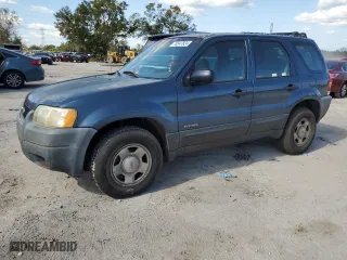 2001 Ford Escape XLS with VIN 1FMYU01BX1KB53168, listed as a Copart auction lot 76547834 with 71,025 mi miles and Salvage Title. Bid and sale history available at carsss.com. Image 1.