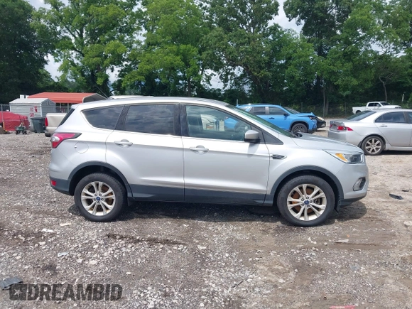 2017 Ford Escape SE z VIN 1FMCU9GD3HUA74463, wystawiony jako IAAI lot #42496171 z przebiegiem 160 534 mil mil oraz . Historia ofert i sprzedaży dostępna na DreamBid. Obrazek 13.
