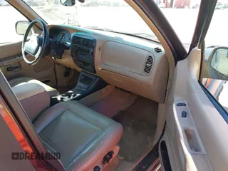 1999 Ford Explorer XLT z VIN 1FMZU35P9XZB88909, wystawiony jako IAAI lot #41759221 z przebiegiem 238 840 mil mil oraz . Historia ofert i sprzedaży dostępna na DreamBid. Obrazek 5.