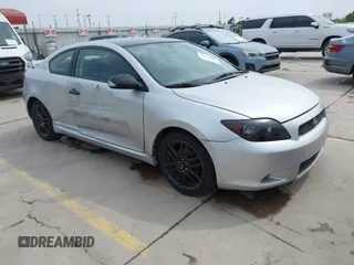 2006 Scion tC with VIN JTKDE177960125897, listed as a IAAI auction lot 41964589 with 215,443 mi miles. Bid and sale history available at carsss.com. Image 1.