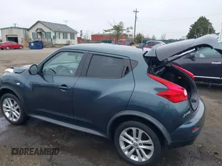2013 Nissan Juke S with VIN JN8AF5MV7DT209881, listed as a IAAI auction lot 41728623 with 185,296 mi miles and . Bid and sale history available at DreamBid. Image 3.