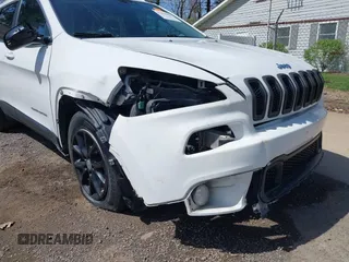 2015 Jeep Cherokee Latitude with VIN 1C4PJLCS3FW670254, listed as a IAAI auction lot 42060659 with 164,291 mi miles. Bid and sale history available at carsss.com. Image 6.