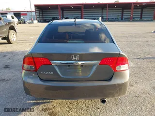 2010 Honda Civic Sdn EX with VIN 19XFA1F80AE026715, listed as a IAAI auction lot 41887154 with 128,272 mi miles. Bid and sale history available at carsss.com. Image 16.