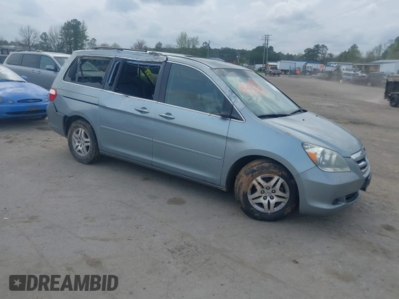 2007 Honda Odyssey EX-L z VIN 5FNRL38757B046761, wystawiony jako IAAI lot #41943033 z przebiegiem 309 270 mil mil oraz . Historia ofert i sprzedaży dostępna na DreamBid. Obrazek 1.