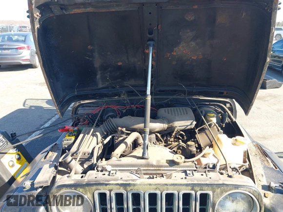 1997 Jeep Wrangler SE with VIN 1J4FY29P6VP438125, listed as a IAAI auction lot 41770455 with 163,001 mi miles. Bid and sale history available at carsss.com. Image 10.