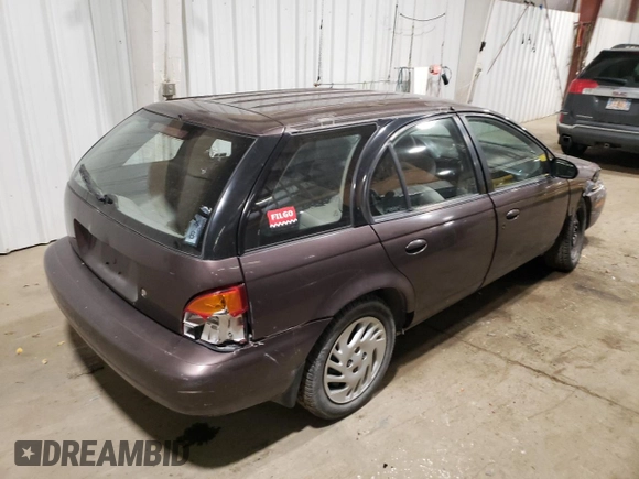 1998 Saturn SW z VIN 1G8ZK8271WZ165967, wystawiony jako Copart lot #73493044 z przebiegiem Nie podano mil oraz Szkoda całkowita • Salvage title. Historia ofert i sprzedaży dostępna na DreamBid. Obrazek 3.