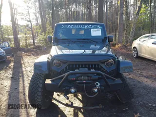 2018 Jeep Wrangler JK Unlimited Altitude with VIN 1C4BJWEG1JL842456, listed as a IAAI auction lot 41123988 with 55,310 mi miles. Bid and sale history available at carsss.com. Image 12.