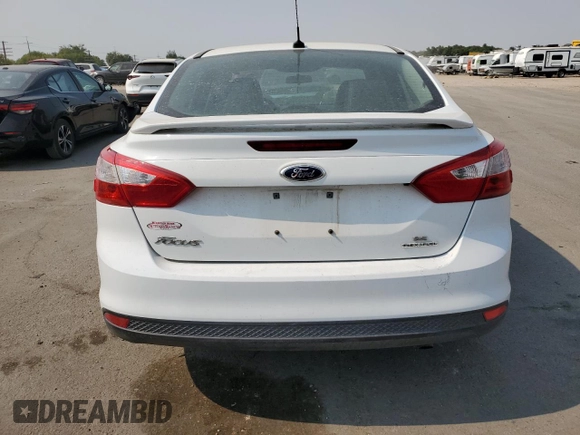 2014 Ford Focus SE with VIN 1FADP3F22EL110454, listed as a Copart auction lot 70076854 with 98,577 mi miles and Salvage Title. Bid and sale history available at carsss.com. Image 6.