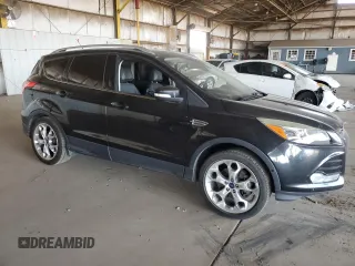 2015 Ford Escape Titanium with VIN 1FMCU0J91FUA17918, listed as a Copart auction lot 64525025 with 130,095 mi miles and Salvage title. Bid and sale history available at DreamBid. Image 4.