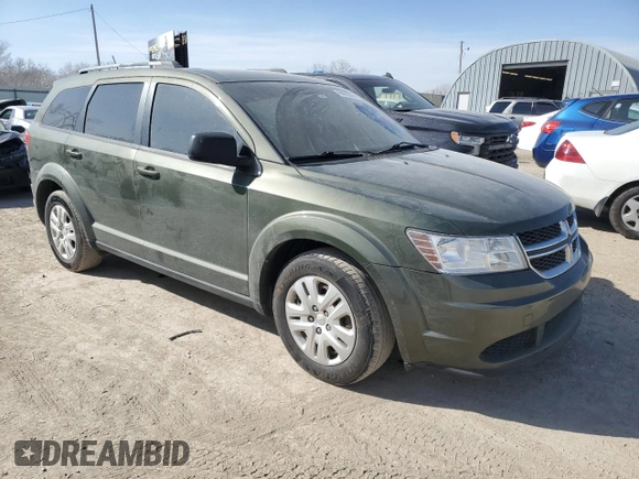 2017 Dodge Journey SE with VIN 3C4PDCAB6HT637705, listed as a Copart auction lot 48400265 with 145,398 mi miles and Salvage Title. Bid and sale history available at DreamBid. Image 4.