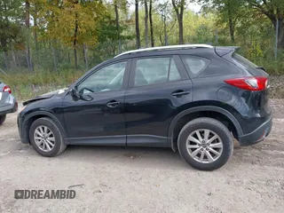 2016 Mazda CX-5 Sport with VIN JM3KE2BE8G0804398, listed as a IAAI auction lot 40490953 with 116,279 mi miles and . Bid and sale history available at DreamBid. Image 13.