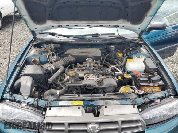 1998 Subaru Legacy L with VIN 4S3BK4358W6309643, listed as a Copart auction lot 57589795 with 250,739 mi miles and Salvage title. Bid and sale history available at DreamBid. Image 12.