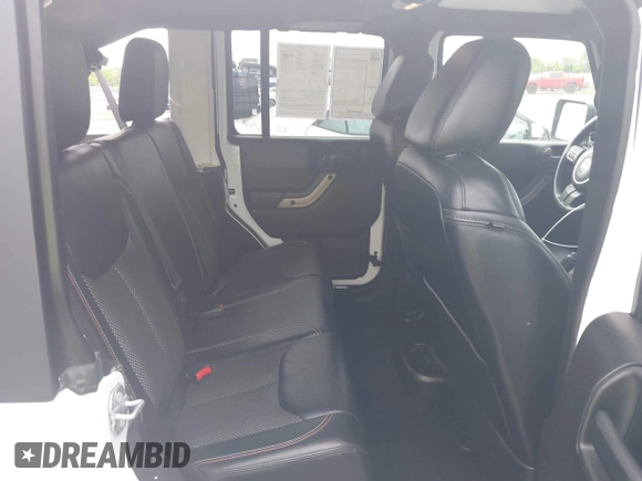 2017 Jeep Wrangler Unlimited 75th Anniversary z VIN 1C4HJWEG8HL502984, wystawiony jako IAAI lot #42354671 z przebiegiem 108 900 mil mil oraz . Historia ofert i sprzedaży dostępna na DreamBid. Obrazek 8.