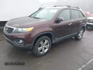 2012 Kia Sorento EX with VIN 5XYKUCA66CG254716, listed as a IAAI auction lot 41928495 with 143,938 mi miles. Bid and sale history available at carsss.com. Image 2.