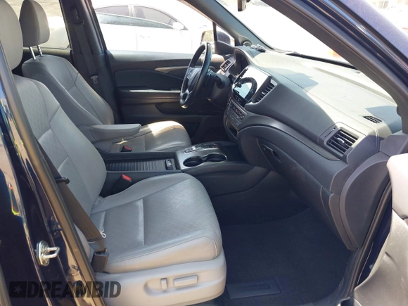 2019 Honda Passport EX-L with VIN 5FNYF7H52KB002430, listed as a IAAI auction lot 42095057 with 88,939 mi miles and . Bid and sale history available at carsss.com. Image 5.