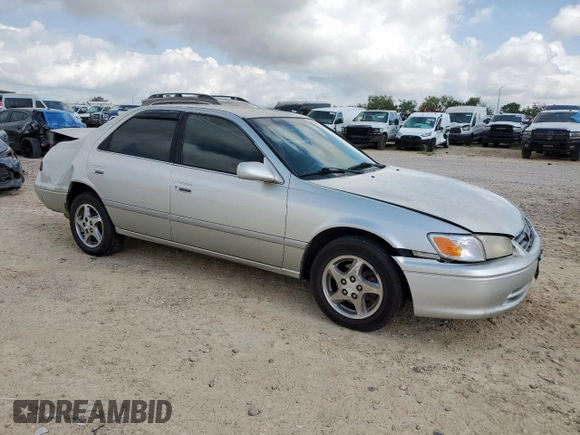 2000 Toyota Camry CE с VIN JT2BG22KXY0391368, выставлен на аукционе Copart как лот 59923575 с пробегом 220 660 миль миль и Списание • Salvage title. История ставок и продаж доступна на DreamBid. Изображение 4.