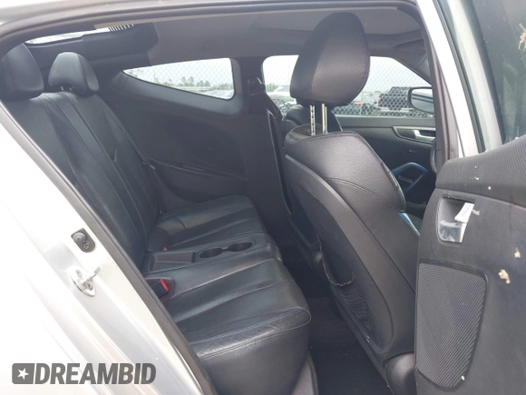 2013 Hyundai Veloster Turbo z VIN KMHTC6AE2DU122273, wystawiony jako IAAI lot #42174272 z przebiegiem 157 152 mil mil oraz . Historia ofert i sprzedaży dostępna na DreamBid. Obrazek 8.