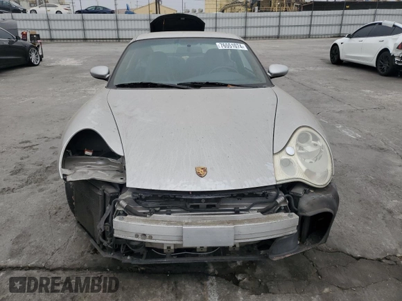 2004 Porsche 911 Carrera z VIN WP0AA29904S623031, wystawiony jako Copart lot #76551074 z przebiegiem 145 478 mil mil oraz Szkoda całkowita • Salvage title. Historia ofert i sprzedaży dostępna na DreamBid. Obrazek 5.