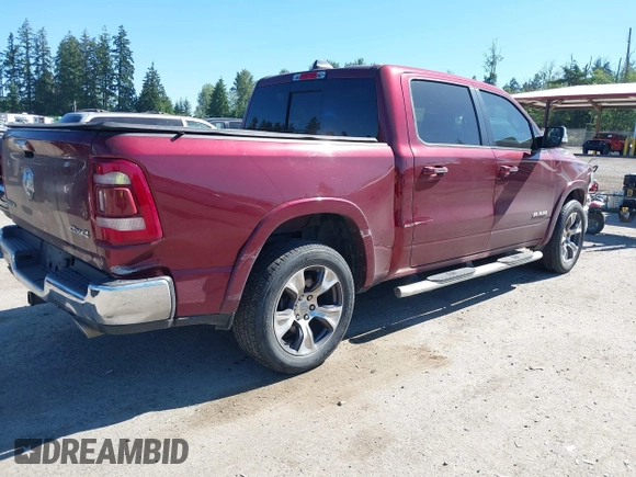 2019 Ram 1500 Laramie with VIN 1C6SRFJT2KN677400, listed as a IAAI auction lot 42441010 with 76,750 mi miles and . Bid and sale history available at DreamBid. Image 4.