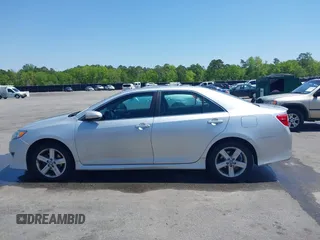2012 Toyota Camry L with VIN 4T1BF1FK4CU061477, listed as a IAAI auction lot 42004963 with 286,689 mi miles. Bid and sale history available at carsss.com. Image 14.