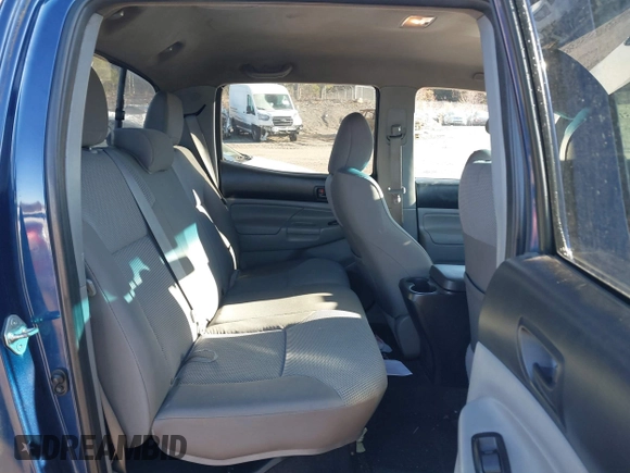 2014 Toyota Tacoma with VIN 3TMLU4EN5EM140028, listed as a IAAI auction lot 40965372 with 94,372 mi miles and . Bid and sale history available at DreamBid. Image 8.