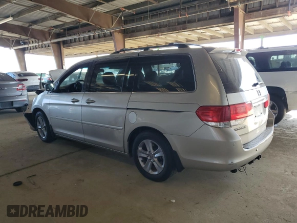 2008 Honda Odyssey Touring with VIN 5FNRL38998B052646, listed as a Copart auction lot 58357145 with 200,943 mi miles and Salvage title. Bid and sale history available at DreamBid. Image 2.