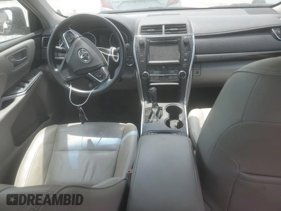 2015 Toyota Camry LE with VIN 4T1BD1FK4FU160598, listed as a Copart auction lot 57113015 with 88,251 mi miles and Salvage title. Bid and sale history available at DreamBid. Image 8.