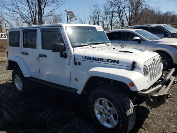 2017 Jeep Wrangler Unlimited Rubicon with VIN 1C4HJWFG9HL543266, listed as a Copart auction lot 50002055 with 50,223 mi miles and Salvage title. Bid and sale history available at DreamBid. Image 4.