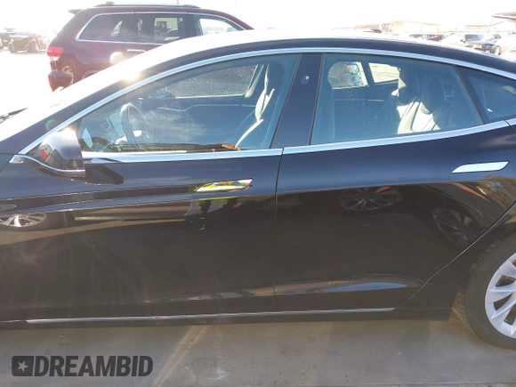 2017 Tesla Model S 60 with VIN 5YJSA1E19HF226094, listed as a IAAI auction lot 40931307 with 80,392 mi miles and . Bid and sale history available at DreamBid. Image 15.
