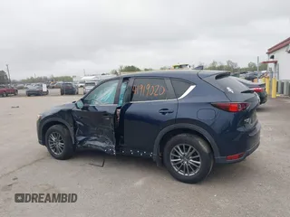 2017 Mazda CX-5 Touring with VIN JM3KFBCL9H0163449, listed as a IAAI auction lot 41919020 with 102,898 mi miles. Bid and sale history available at carsss.com. Image 14.