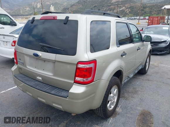 2012 Ford Escape XLT with VIN 1FMCU0D74CKA07739, listed as a IAAI auction lot 42100820 with 308,265 mi miles. Bid and sale history available at carsss.com. Image 4.