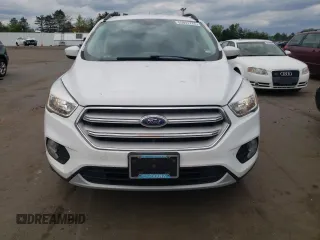 2018 Ford Escape SE z VIN 1FMCU9GDXJUA71940, wystawiony jako Copart lot #55891775 z przebiegiem 117 298 mil mil oraz Tytuł czysty. Historia ofert i sprzedaży dostępna na DreamBid. Obrazek 5.