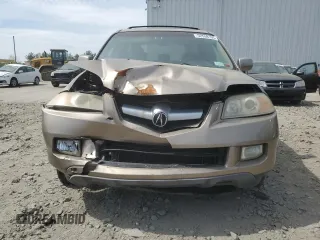 2006 Acura MDX Touring z VIN 2HNYD18876H510562, wystawiony jako Copart lot #52558195 z przebiegiem 205 642 mil mil oraz Szkoda całkowita • Salvage title. Historia ofert i sprzedaży dostępna na DreamBid. Obrazek 5.