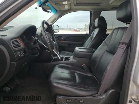 2014 Chevrolet Suburban LT with VIN 1GNSCJE07ER160935, listed as a Copart auction lot 46928335 with 123,811 mi miles and Salvage Title. Bid and sale history available at carsss.com. Image 7.
