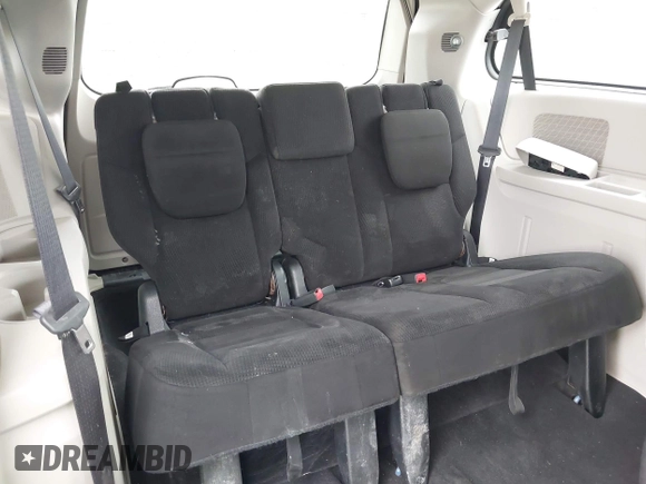 2015 Dodge Grand Caravan SXT with VIN 2C4RDGCG7FR524712, listed as a IAAI auction lot 41956063 with 111,144 mi miles and . Bid and sale history available at DreamBid. Image 20.