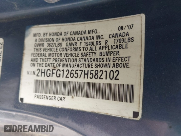 2007 Honda Civic Cpe LX with VIN 2HGFG12657H582102, listed as a IAAI auction lot 42030068 with 166,172 mi miles. Bid and sale history available at carsss.com. Image 9.