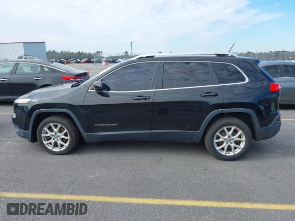 2014 Jeep Cherokee Latitude with VIN 1C4PJLCB0EW288309, listed as a IAAI auction lot 41624746 with 164,037 mi miles and . Bid and sale history available at DreamBid. Image 14.