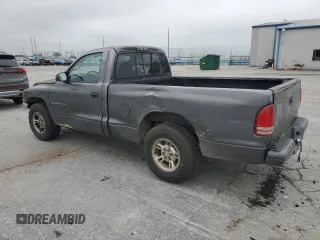 2002 Dodge Dakota с VIN 1B7FL46XX2S511526, выставлен на аукционе Copart как лот 57955594 с пробегом 244 367 миль миль и Списание • Salvage title. История ставок и продаж доступна на DreamBid. Изображение 2.