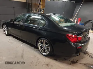 2014 BMW 7 Series ALPINA B7 xDrive with VIN WBAYF8C53ED141858, listed as a IAAI auction lot 40987098 with 128,404 mi miles and . Bid and sale history available at DreamBid. Image 3.