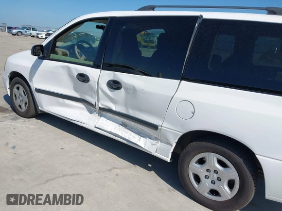 2006 Ford Freestar SE z VIN 2FMZA51686BA57540, wystawiony jako IAAI lot #41883258 z przebiegiem 38 590 mil mil oraz . Historia ofert i sprzedaży dostępna na DreamBid. Obrazek 6.