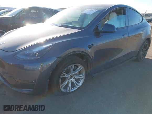 2023 Tesla Model Y Long Range with VIN 7SAYGAEEXPF714760, listed as a IAAI auction lot 41748398 with 49,802 mi miles and . Bid and sale history available at DreamBid. Image 6.