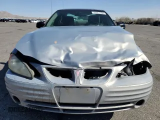 1999 Pontiac Grand Am SE2 with VIN 1G2NE52E5XM826878, listed as a Copart auction lot 77351164 with 241,463 mi miles and Salvage Title. Bid and sale history available at carsss.com. Image 5.