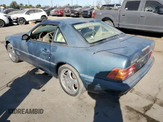 1999 Mercedes-Benz SL-Class with VIN WDBFA68F9XF175145, listed as a Copart auction lot 42160385 with 221,036 mi miles and Salvage Title. Bid and sale history available at carsss.com. Image 2.